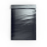 Glansig metallisk bubbelpåsa